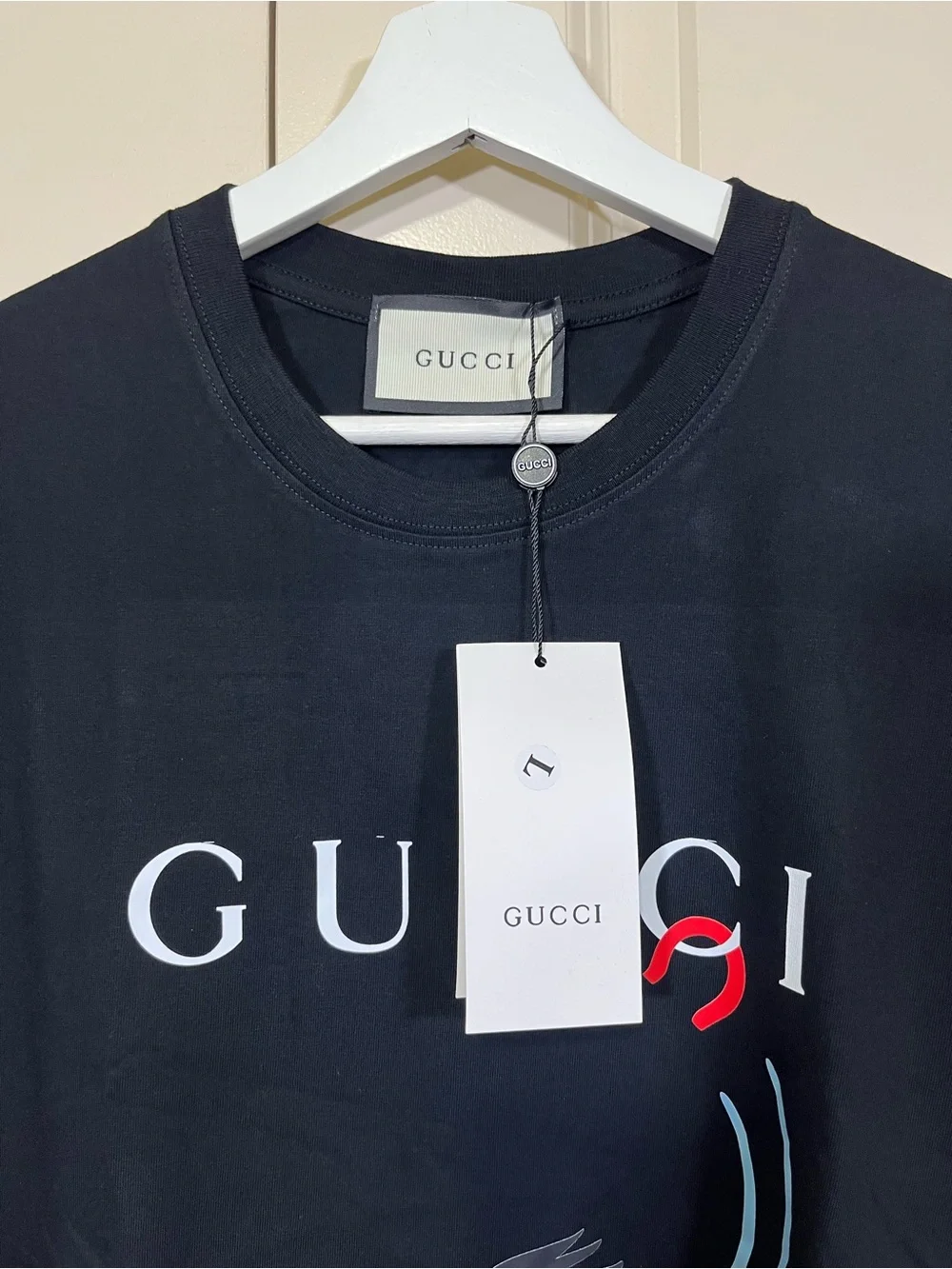 Gucci Black Tee with Colorful Horse Graphic and White Logo